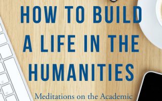 an image of a desk with a keyboard, mouse, and cell phone