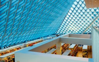 an image of a large room with a lot of books on the shelves