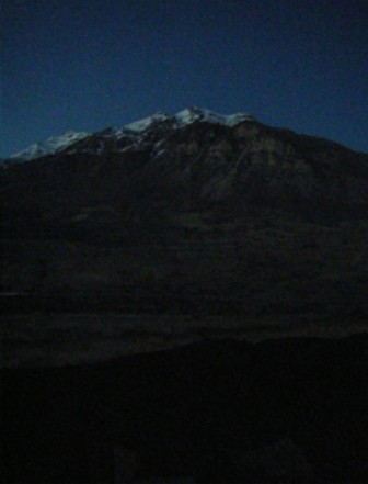 A distant snow-capped mountaintop